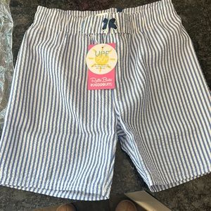 Ruffle butts seersucker swim trunks